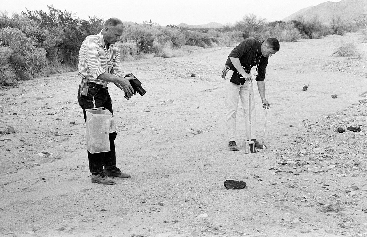 Buzz Takes a Different Approach: Running Coding Agents in Git Worktrees Instead of Sandboxes — Buzz (left) takes a handheld documentation photo while Neil appears to be using the tongs to collect a sample