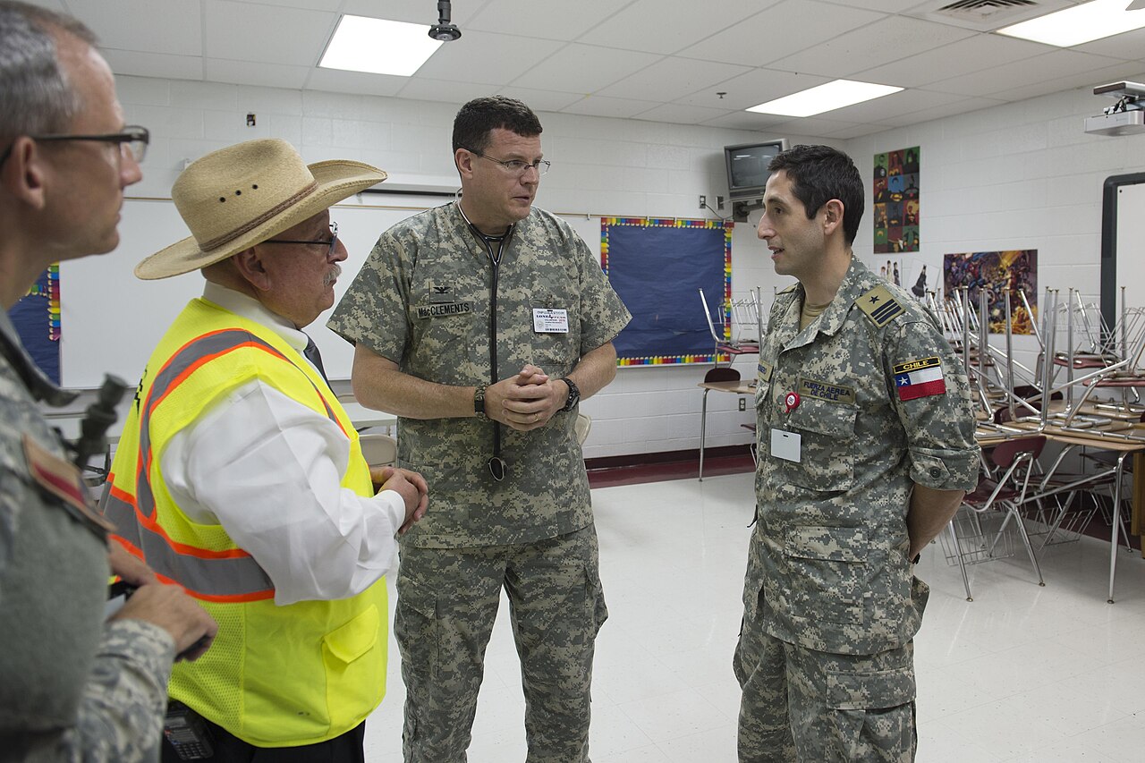 DHH Discusses Programming, AI, Vibe Coding, and Linux on Lex Fridman Podcast — Maj. Enrique Romero, a physician in the Chilean Air Force, discusses medical operations with Col. Jonathan MacClements, Texas State Guard