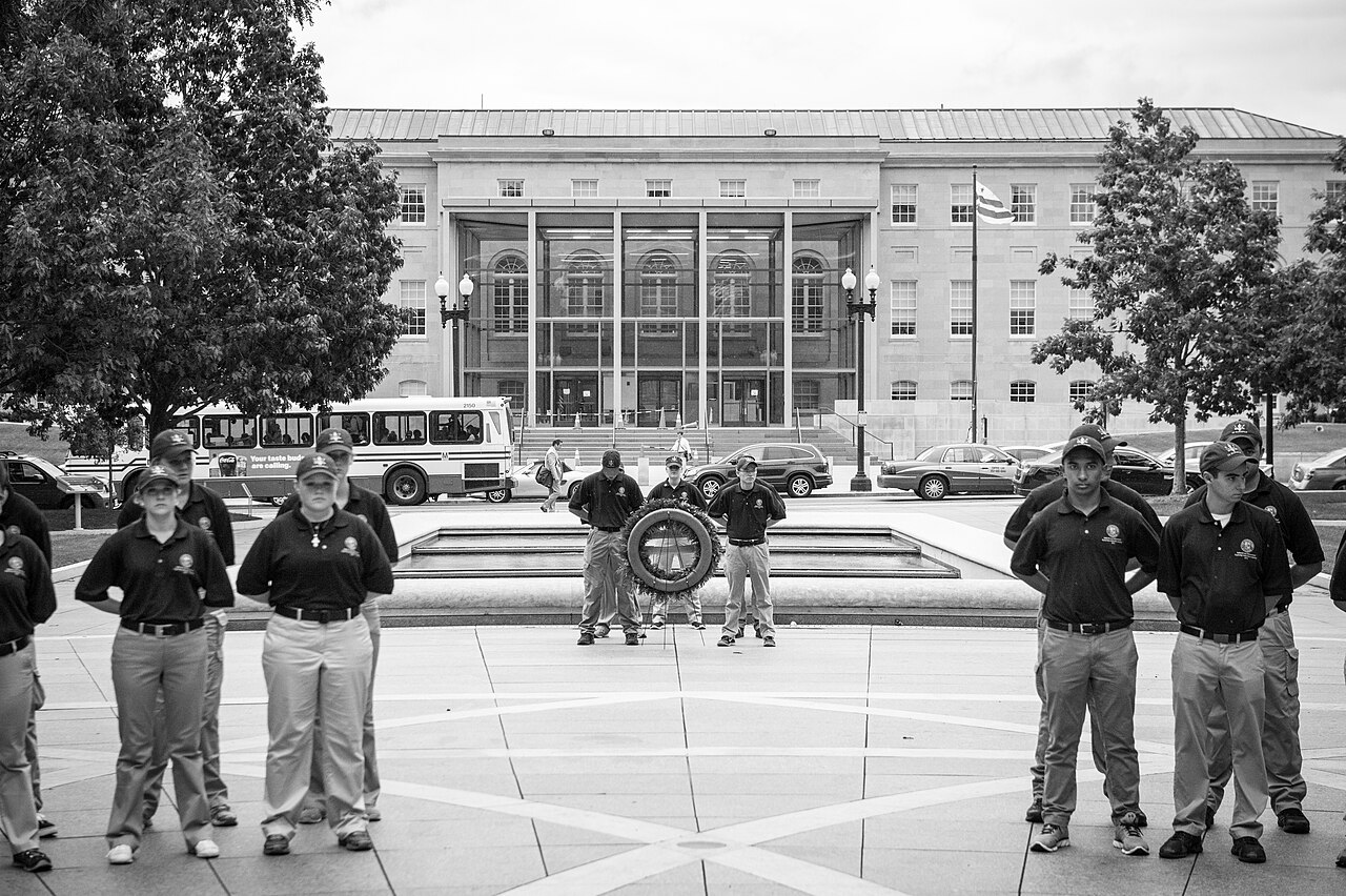 NBER Paper Explores Whether AI Assistance Enhances or Erodes Expertise — 2015 Law Enforcement Explorers Conference black and white shot by memorial