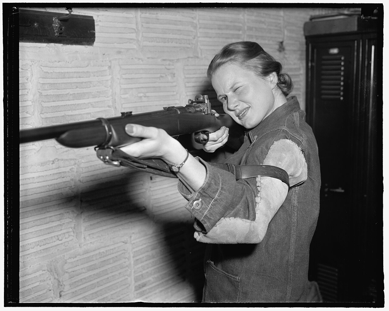 Washington Won't Be Regulating AI Anytime Soon — Co-ed crowned queen of rifle shooters. Washington, D.C., April 6. Jean Yocum, George Washington University co-ed, has won the Women's Individual Intercollegiate Rifle Championship, according LCCN2016875393