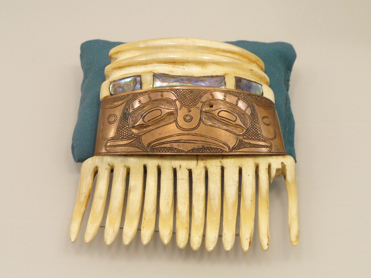 Aty Brings Native Shell AI Assistant to the Terminal — Comb, Haida or Tlingit, carved ivory with copper and shell - Native American collection - Peabody Museum, Harvard University - DSC05661