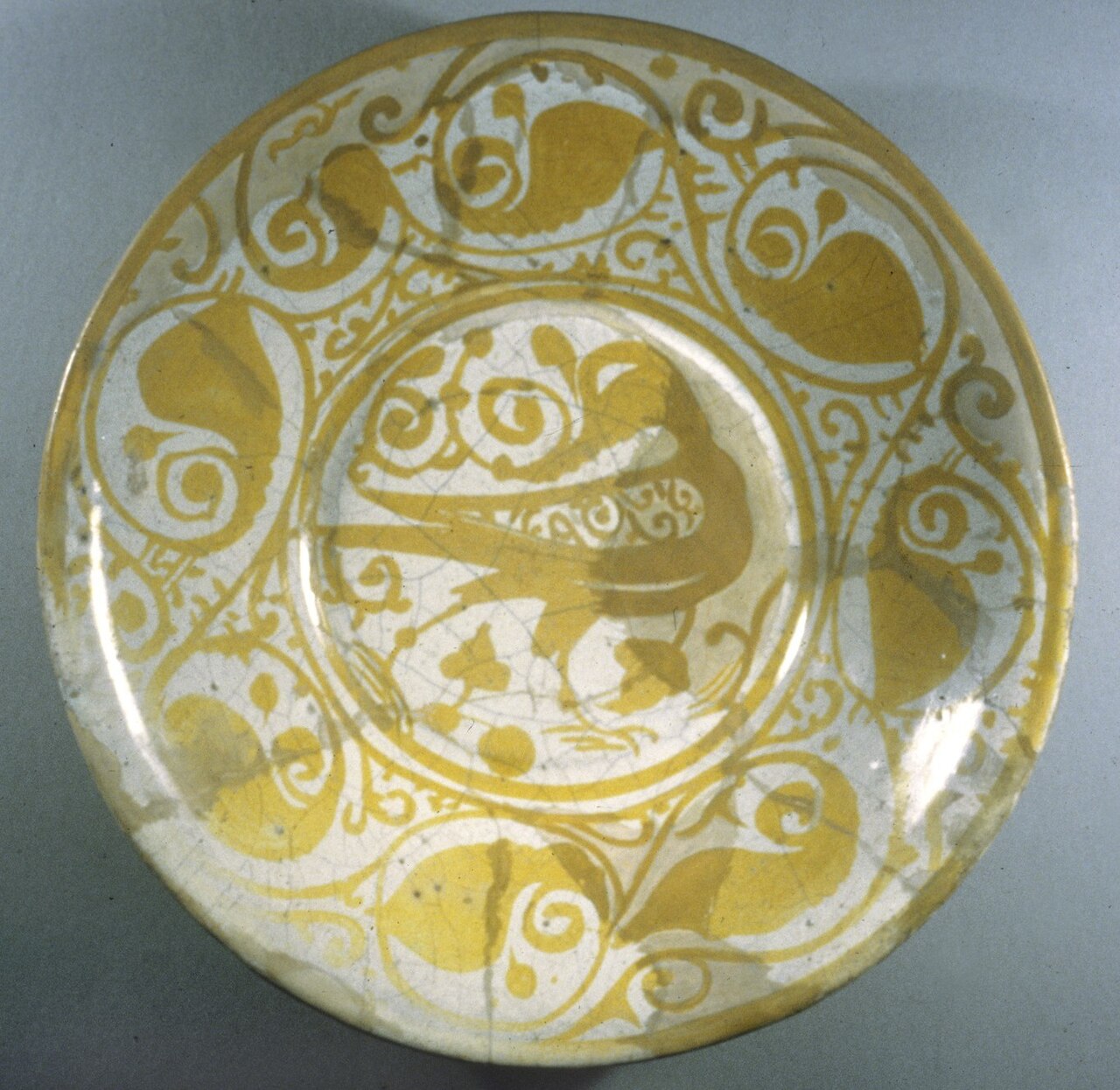 Motif Agent Platform Tackles Pre-GitHub Coordination Chaos — Lusterware Plate with Bird Motif