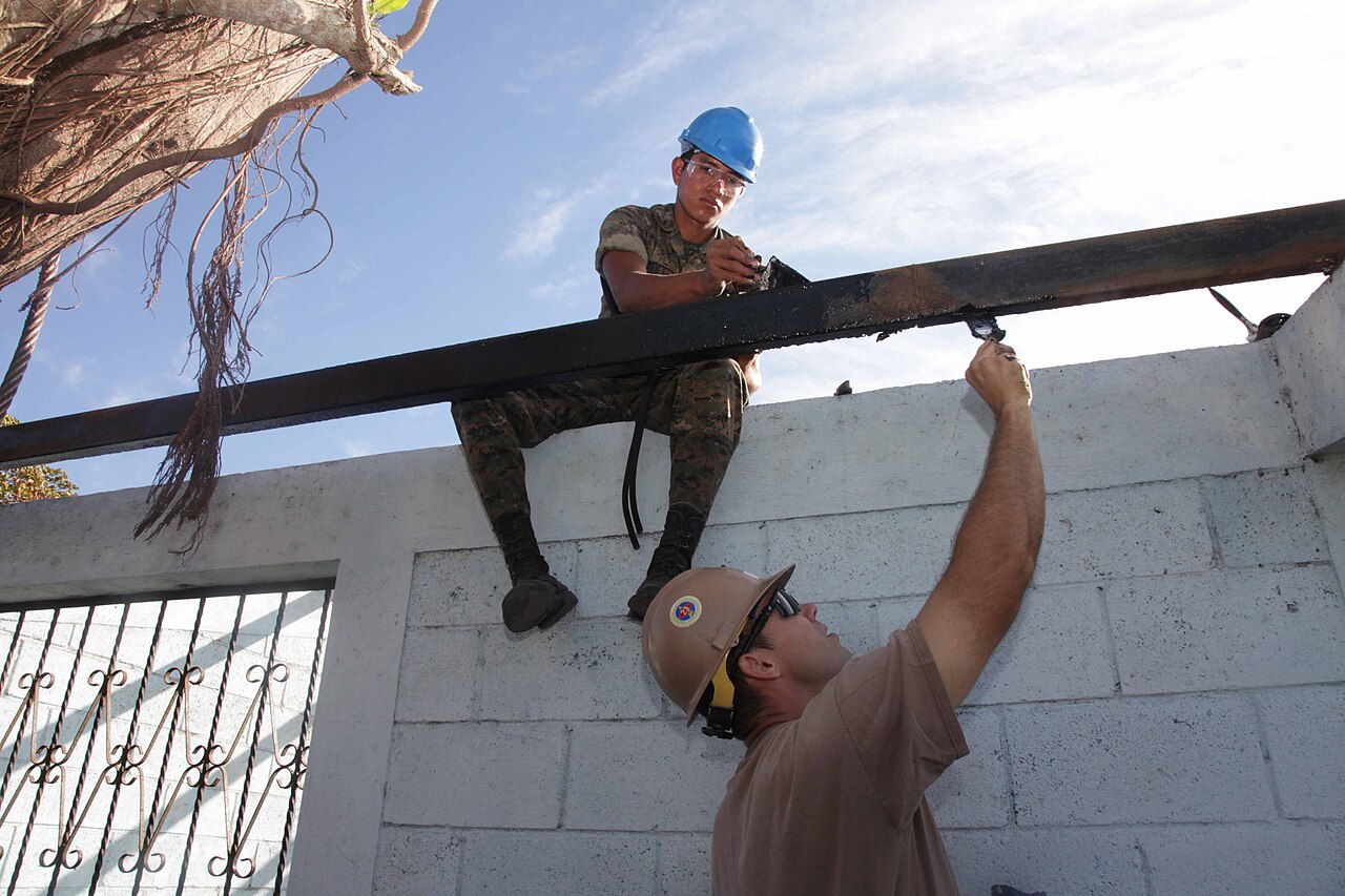 NorvikTech Releases Rust Guard to Secure Multi-Tenant AI Environments — US Navy 120105-A-IP644-045 Builder 2nd Class Nicholas Fox paints rust guard on a rafter