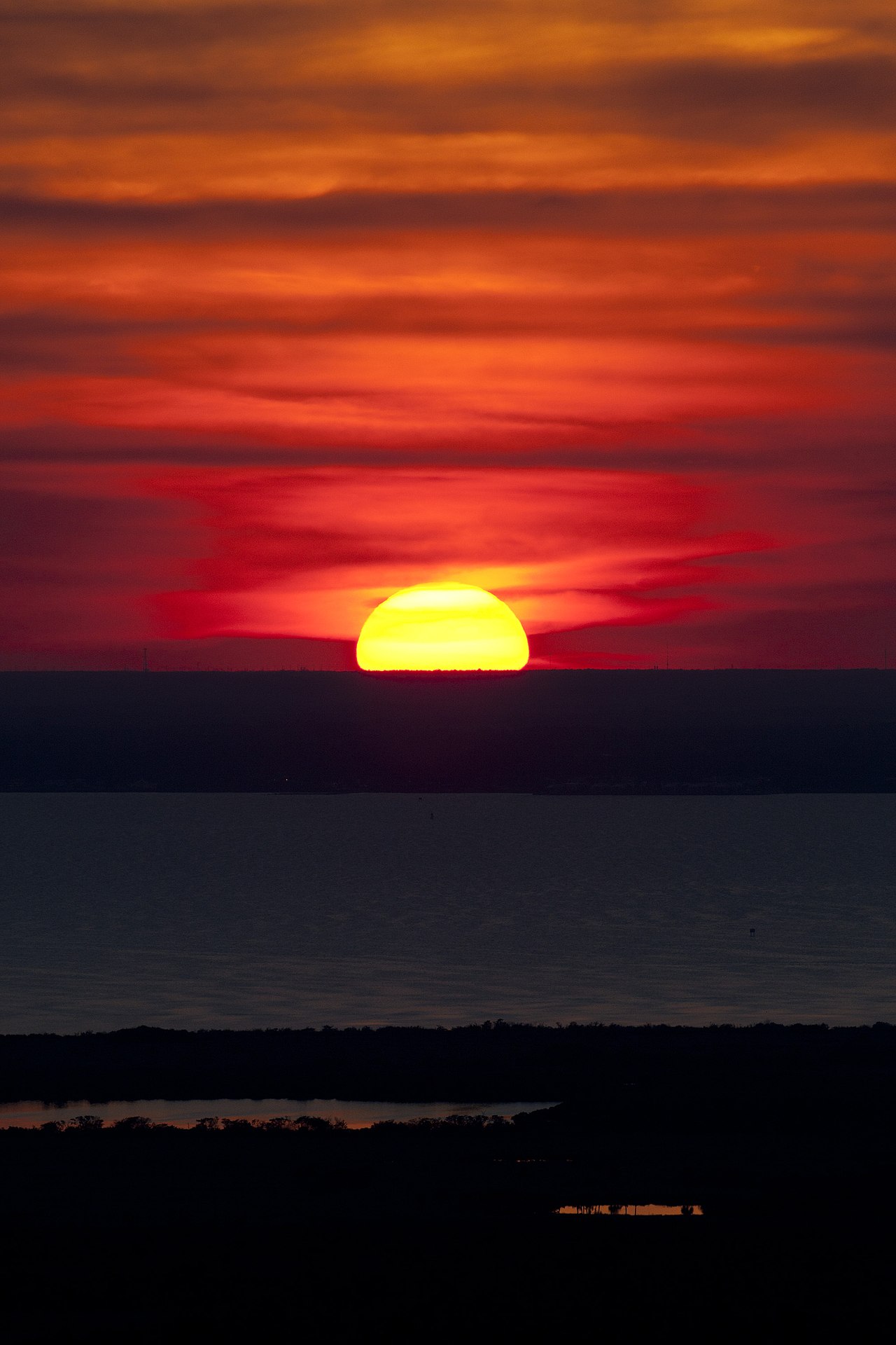 Humanoid Training Shifts Bottleneck From Capture Studios to Measured 3D Worlds — Vivid sunset at Kennedy Space Center during training for STS-133